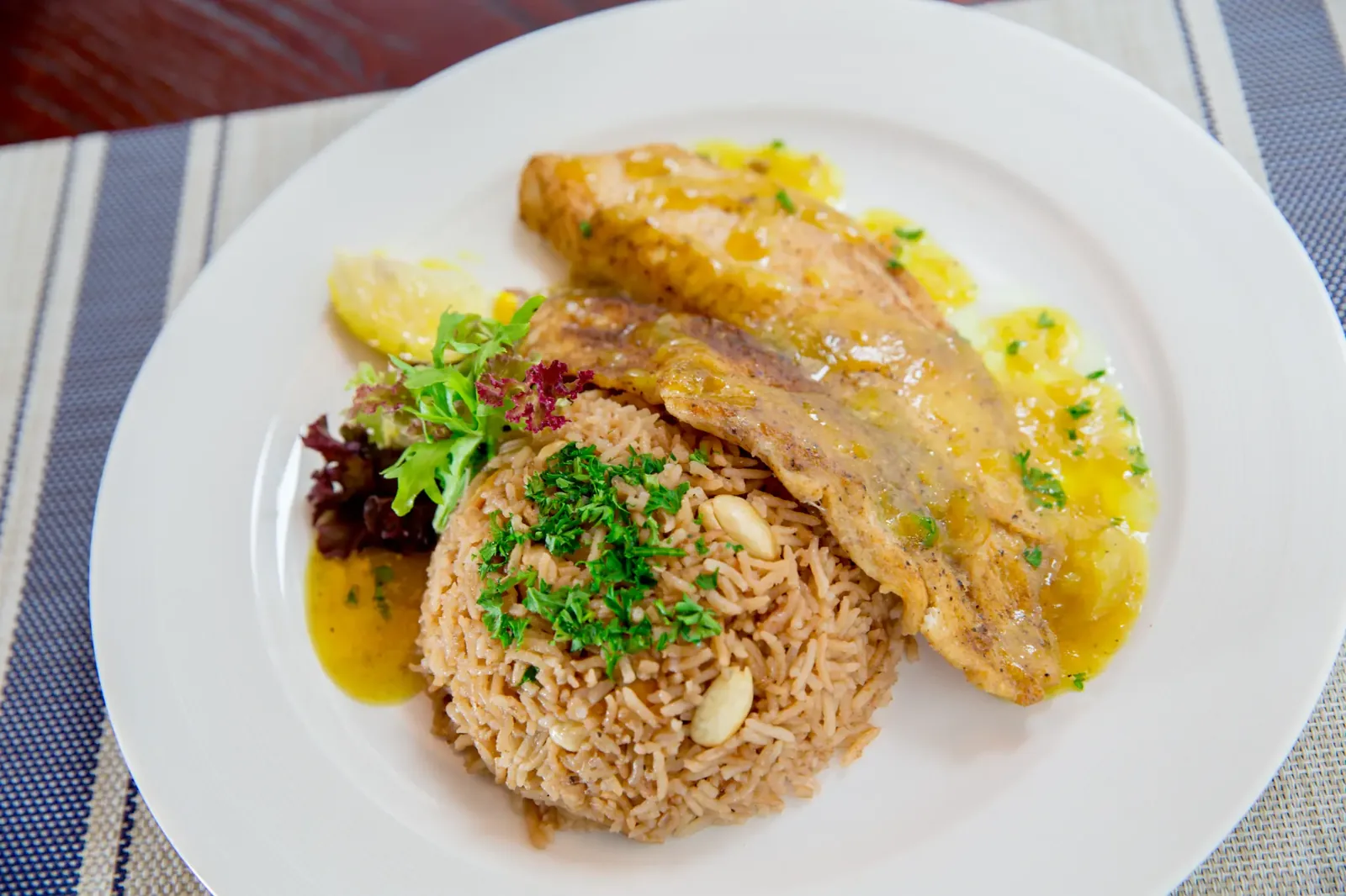 Traditional rice and meat dish at MAKAN